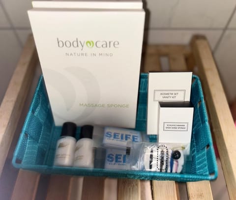 Shower, free toiletries, hair dryer, slippers