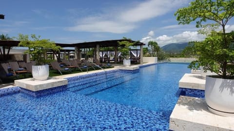 Outdoor pool, free cabanas, pool umbrellas
