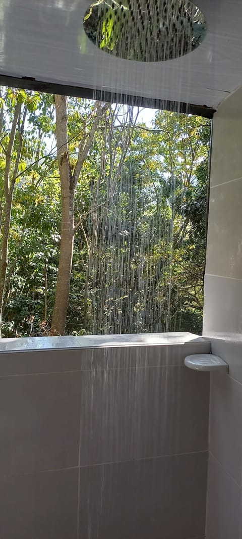Design Cabin | Bathroom | Shower, rainfall showerhead, towels, soap