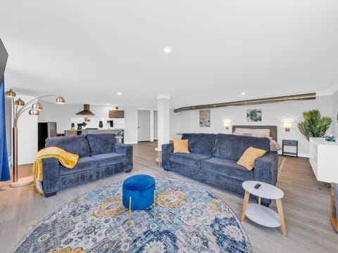 Luxury Apartment, Lake View | Living area | 65-inch Smart TV with digital channels, streaming services