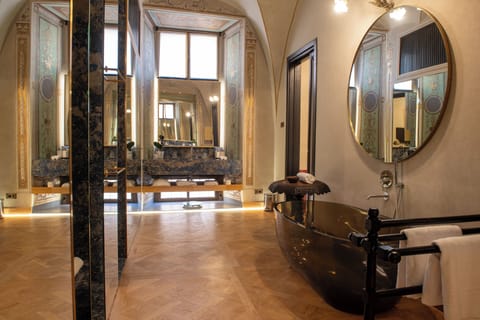 Shower, rainfall showerhead, designer toiletries, hair dryer