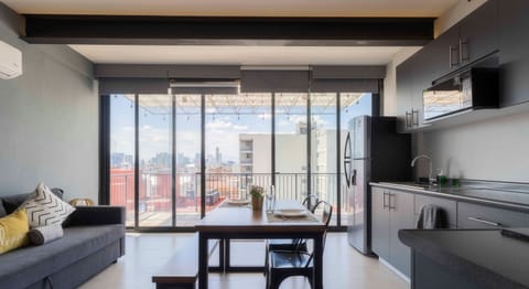 Panomaric Apartment FPH2 | Private kitchen | Full-size fridge, microwave, stovetop, coffee/tea maker