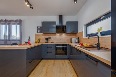 Microwave, dishwasher, coffee/tea maker, highchair