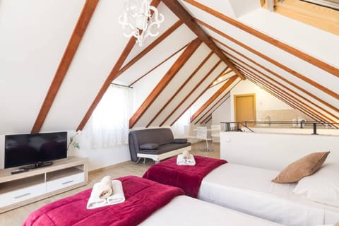 Comfort Studio, Balcony, City View | Desk, bed sheets