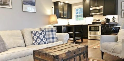 Family Cottage | Living area | 27-inch flat-screen TV with digital channels