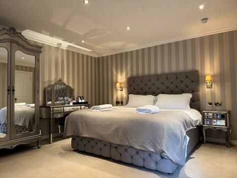 Daffodil Room | Blackout drapes, iron/ironing board, bed sheets