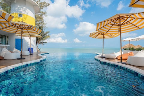 Outdoor pool, pool umbrellas, sun loungers