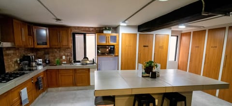 Deluxe Room, City View | Shared kitchen facilities | Microwave, oven, stovetop, toaster