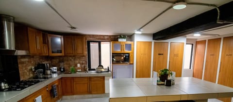 Deluxe Room | Shared kitchen facilities | Mini-fridge, microwave, rice cooker, blender