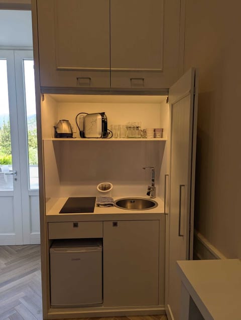 Superior Studio | Private kitchen | Espresso maker, coffee/tea maker, electric kettle, dining tables