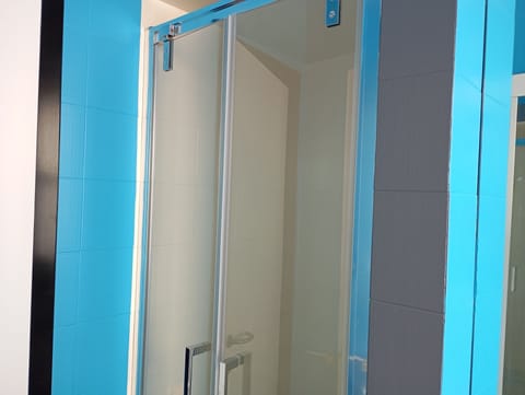 Quadruple Room, Courtyard View | Bathroom | Shower, rainfall showerhead, hair dryer, bidet