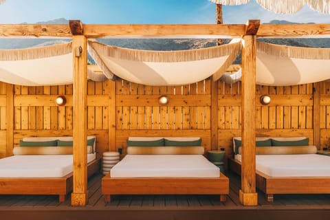 Outdoor pool, open 8:00 AM to 10:00 PM, cabanas (surcharge)