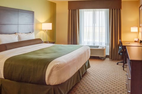 Premium bedding, down comforters, pillowtop beds, in-room safe