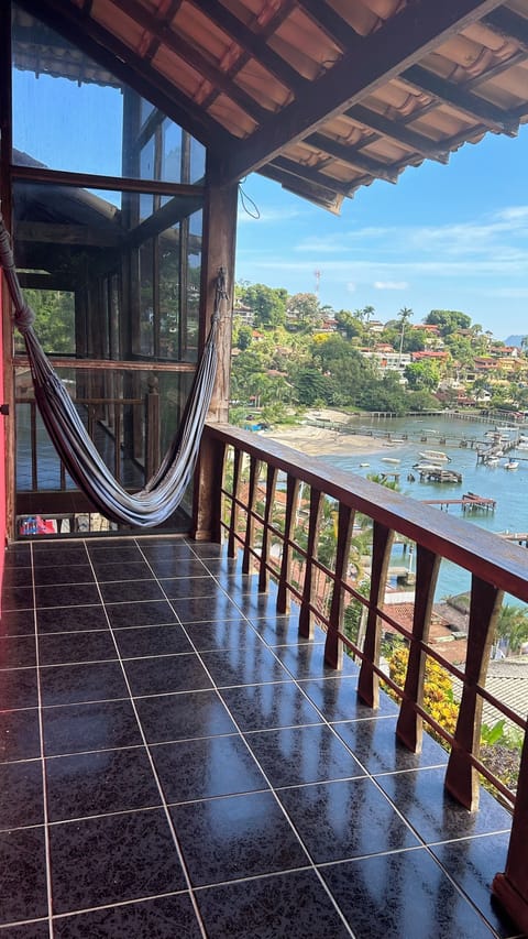 Luxury Room, Sea View | Living area | 32-inch Smart TV with digital channels