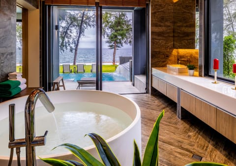 Family Villa, 2 Bedrooms, Beachfront | Bathroom | Hair dryer, slippers, bidet, towels