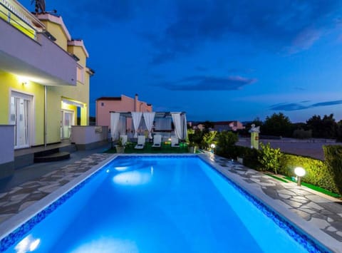 Villa (Villa Ava) | Pool | Seasonal outdoor pool, pool umbrellas, sun loungers