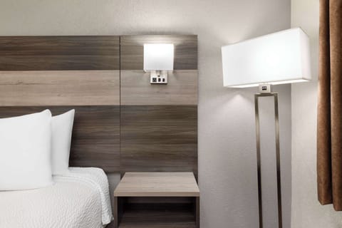 Desk, laptop workspace, blackout drapes, free cribs/infant beds