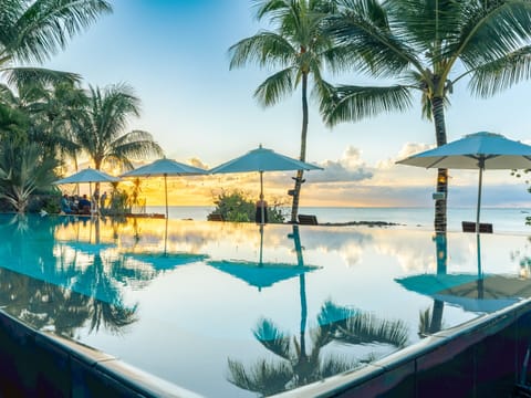 Outdoor pool, open 10 AM to 6:30 PM, sun loungers