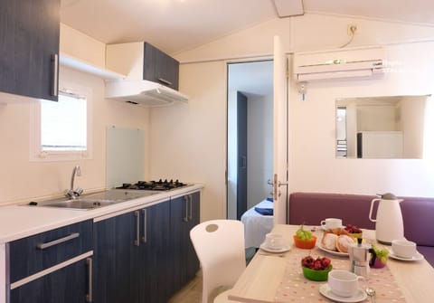 Standard Mobile Home | Private kitchen | Full-size fridge, stovetop, highchair, cookware/dishes/utensils