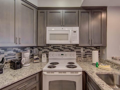 Condo, 1 King Bed with Sofa bed (Palm Beach A14) | Private kitchen | Oven