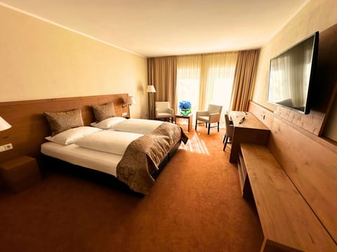 Superior Room | Hypo-allergenic bedding, down comforters, in-room safe, desk