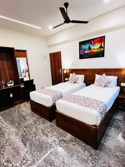 Deluxe Double or Twin Room, City View | Minibar, in-room safe, iron/ironing board, free WiFi