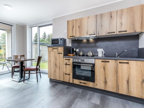 Bungalow | Private kitchen | Electric kettle, highchair