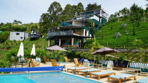 Outdoor pool, open 10:00 AM to 11:00 PM, pool umbrellas, sun loungers