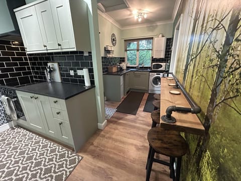 Cabin | Private kitchen | Fridge, microwave, oven, stovetop