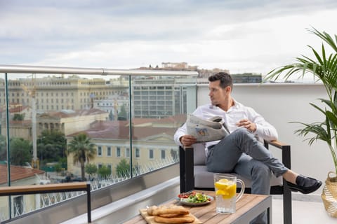 Junior Suite, City View | In-room safe, iron/ironing board, free WiFi, bed sheets