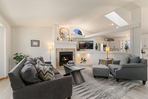 House, Multiple Beds, Patio, Garden View (2719 Daffodil Place - Whole House) | Living area | 42-inch flat-screen TV with digital channels, TV, fireplace