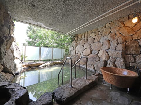 Separate tub and shower, free toiletries, hair dryer, slippers