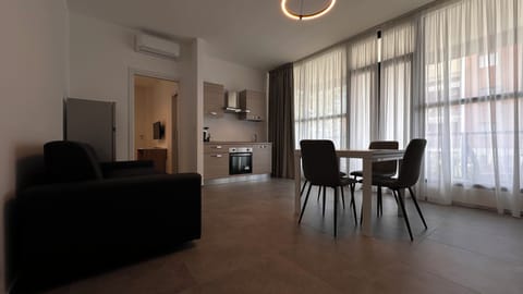 Deluxe Apartment | Living area | Smart TV