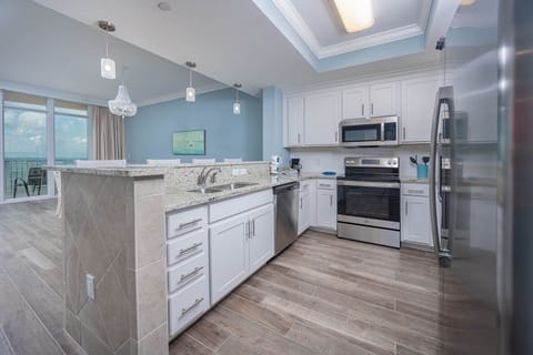 Condo, 2 Bedrooms | Private kitchen | Fridge, oven, coffee/tea maker