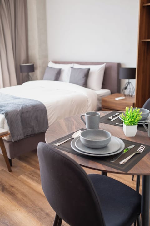 Family Room | Premium bedding, down comforters, pillowtop beds, laptop workspace