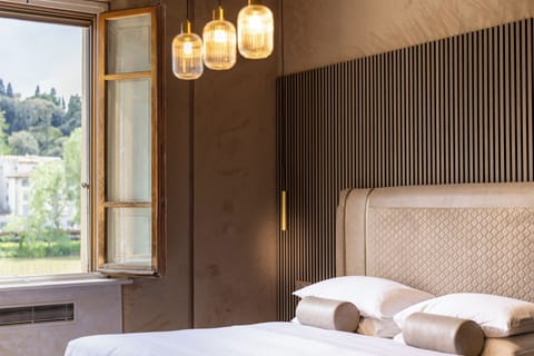 Family Suite, River View | Premium bedding, down comforters, memory foam beds, free minibar