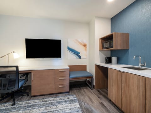 Desk, blackout drapes, iron/ironing board, bed sheets