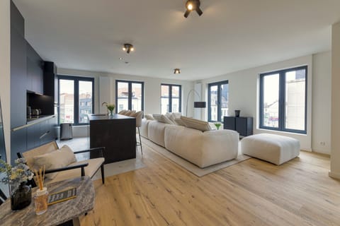 Luxury Duplex, City View | Living area | Flat-screen TV