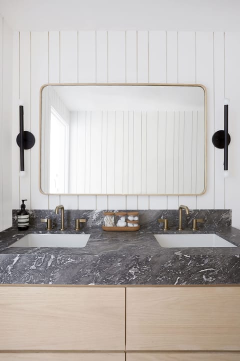 Shower, designer toiletries, hair dryer, towels