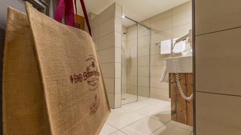 Superior Suite, 3 Bedrooms, Balcony, Mountain View (Eiger) | Bathroom | Combined shower/tub, free toiletries, hair dryer, bathrobes