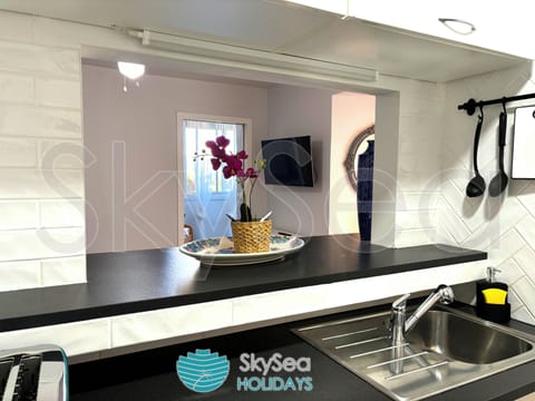 Family Apartment, 2 Bedrooms, Pool View | Private kitchen | Full-size fridge, microwave, stovetop, dishwasher
