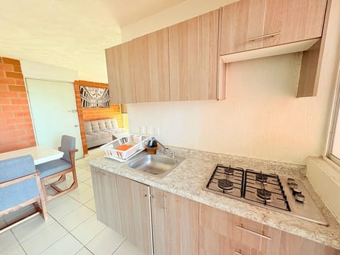 Fridge, microwave, dishwasher, coffee/tea maker