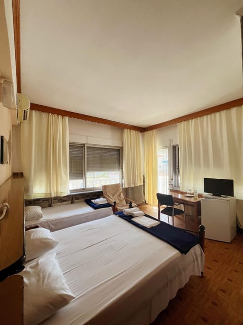 Classic Triple Room, Balcony, Sea View | Desk, laptop workspace, free WiFi, bed sheets