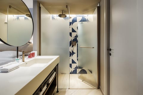 Shower, rainfall showerhead, eco-friendly toiletries, hair dryer