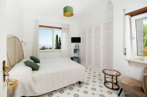 Comfort Double or Twin Room, Sea View | Minibar, in-room safe, individually decorated, individually furnished