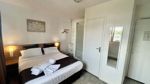Basic Double Room, Courtyard View | Memory foam beds, iron/ironing board, free WiFi, bed sheets