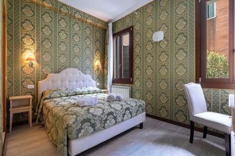 Deluxe Single Room, City View | Desk, laptop workspace, WiFi (free), bed sheets