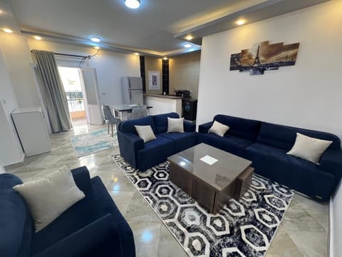 Comfort Apartment, Balcony, City View | Living area | Flat-screen TV