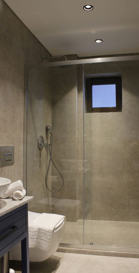 Standard Room, Courtyard View | Bathroom | Shower, hair dryer, towels, soap