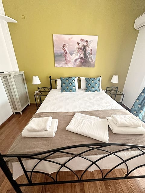 Apartment, Balcony, City View | Iron/ironing board, free WiFi